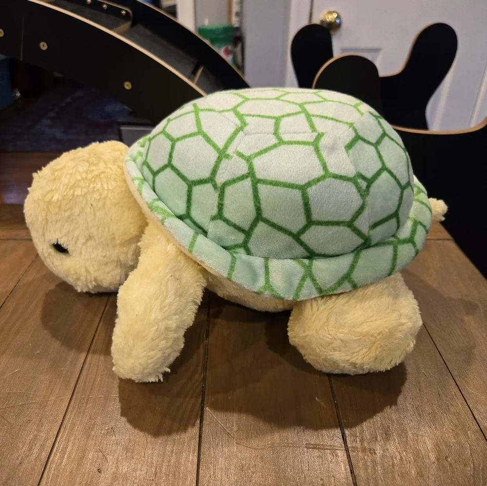 Plush Aurora Turtle Toy with Green Shell